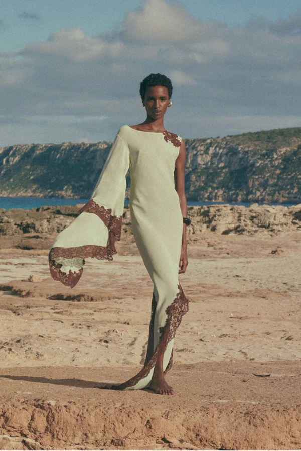 <a href="https://www.delavali.com/products/veta-maxi-dress-in-mint-green-crepe-de-chine">DE LA VALI Veta Maxi Dress</a>, $890