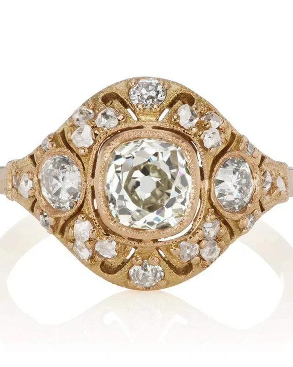 <a href="https://andriabarbone.com/products/vintage-style-halo-engagement-ring?_pos=12&_sid=4eeb42328&_ss=r">Andria Barboné</a>