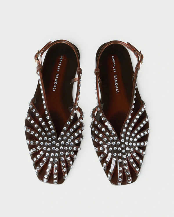 <a href="https://loefflerrandall.com/products/devon-brown-jelly-slingback-sandal">LOEFFLER RANDALL Devon Brown Jelly Slingback Sandal</a>, $195