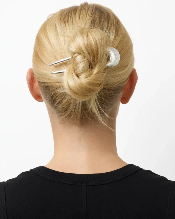 <a href="https://lie-studio.com/products/the-frida-hair-pin-silver?shpxid=5f72fe1e-7009-4532-a7a5-ed0342b1f104">LIÉ STUDIO </a><span style="font-family: 'GT America', sans-serif;"><a href="https://lie-studio.com/products/the-frida-hair-pin-silver?shpxid=5f72fe1e-7009-4532-a7a5-ed0342b1f104">The Frida Hair Pin</a>, $280</span>