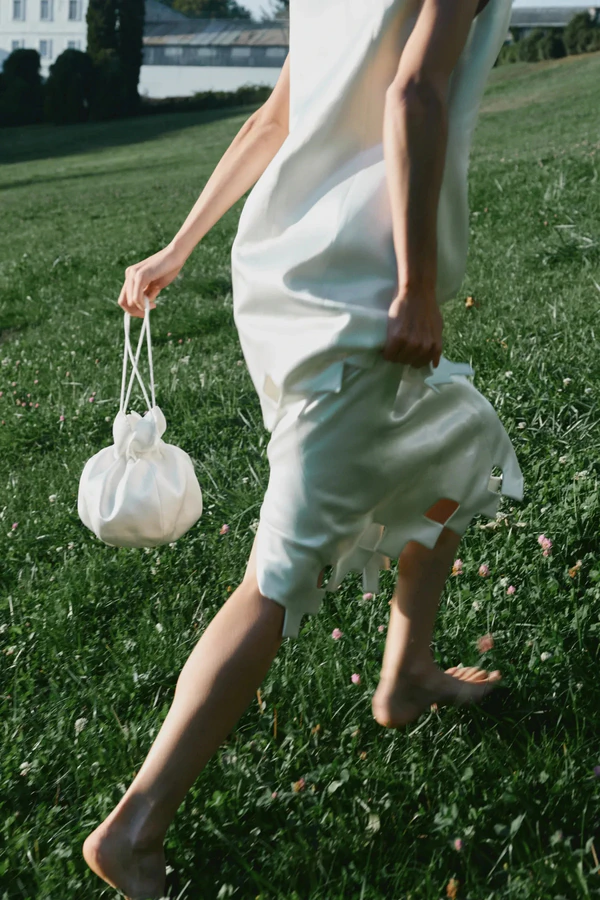 <a href="https://podyh.com/products/nar-bag-white?_pos=4&_fid=f6232eb12&_ss=c">PODYH Bag</a>, $234