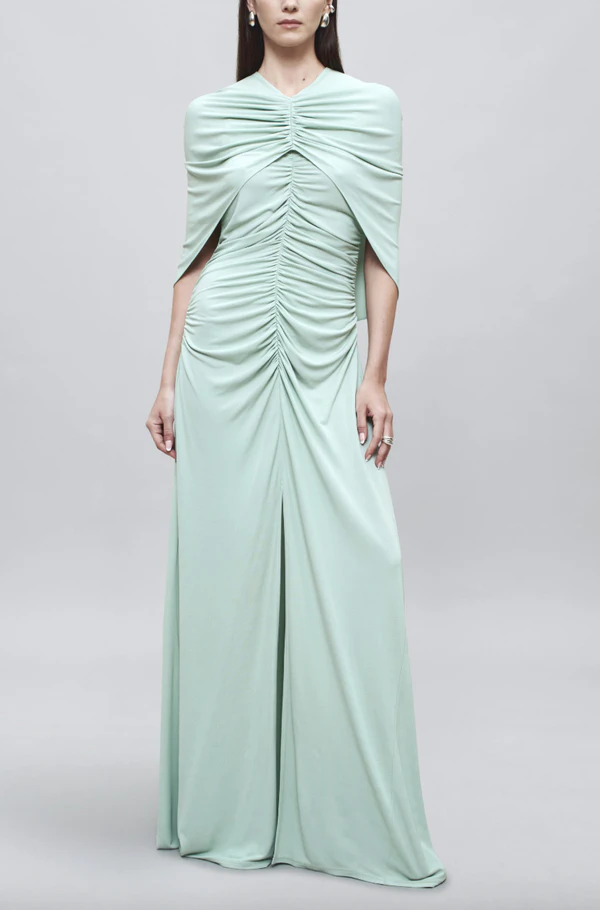 <a href="https://kallmeyer.nyc/products/dkrt262007-matilda-cape-gown-matte-jersey-jade?option1=XS">Kallmeyer</a>