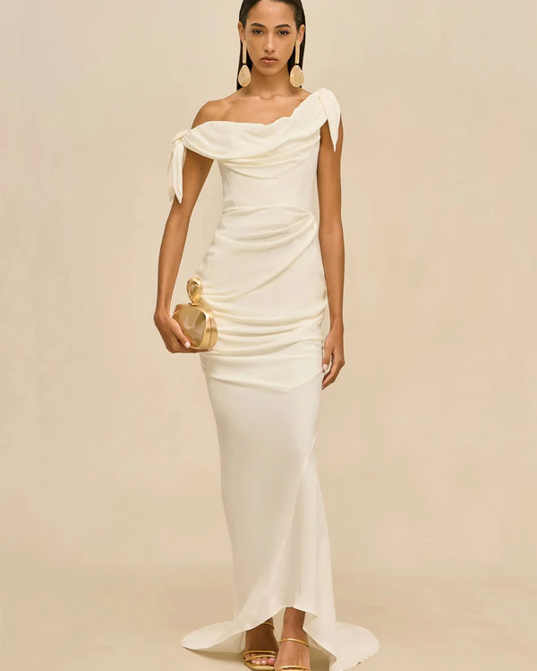 <a href="https://cultgaia.com/products/nysa-gown-off-white?variant=43312856039498">CULT GAIA Dress</a>, $1,198