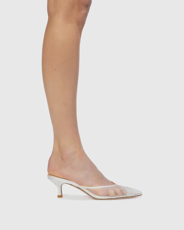 <a href="https://blacksuedestudio.com/products/cara-50-white?variant=50537012003136">BLACK SUEDE STUDIO Cara 50 Mule</a>, $328