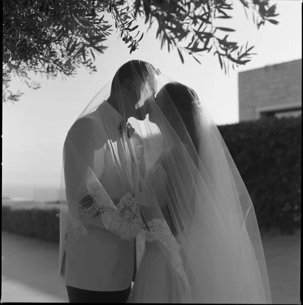 A Cinematic & Artistic Color-Washed Wedding Weekend at Amanzoe in Greece