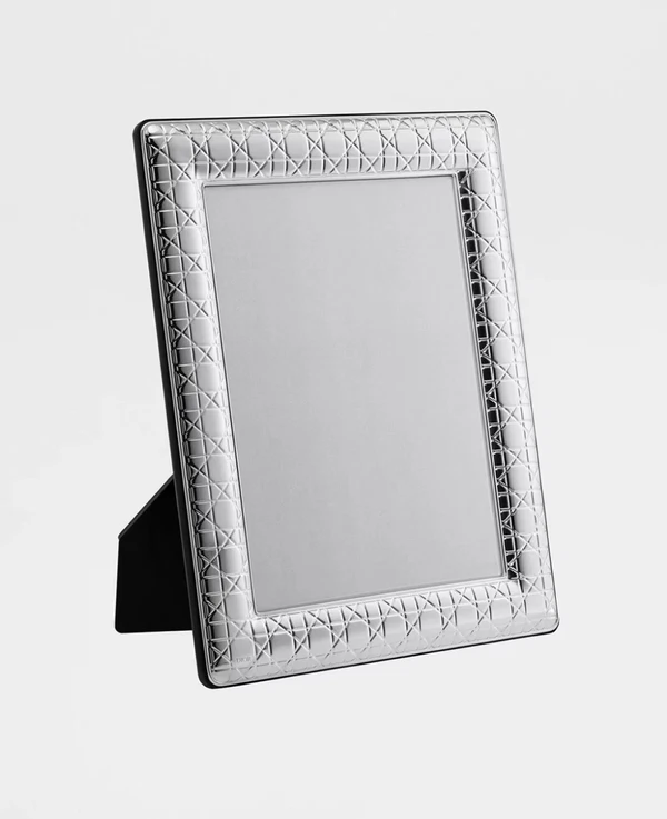 <a href="https://www.dior.com/en_us/fashion/products/HYB01CCA1U_C090?indexName=search_prod_live_en_us&objectID=HYB01CCA1U_C090&query=picture%20frame&queryID=092e1bd4cf315679e45da74ff000b9c6">DIOR Picture Frame, $700</a>