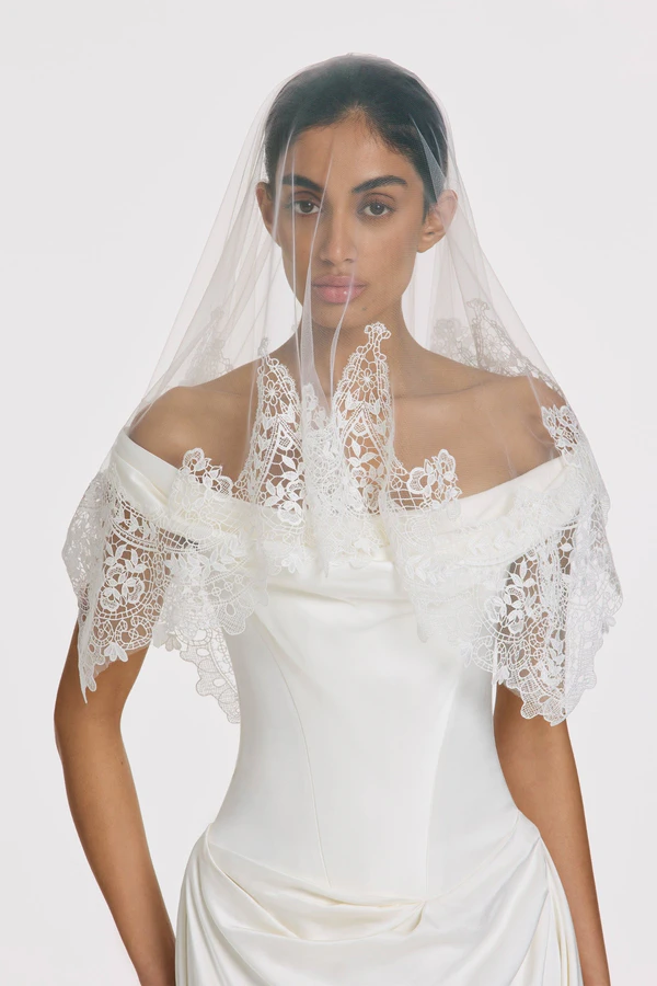 <a href="https://kyhastudios.com/collections/veils/products/gregory-veil?variant=0">KYHA BRIDE Veil</a>, $495