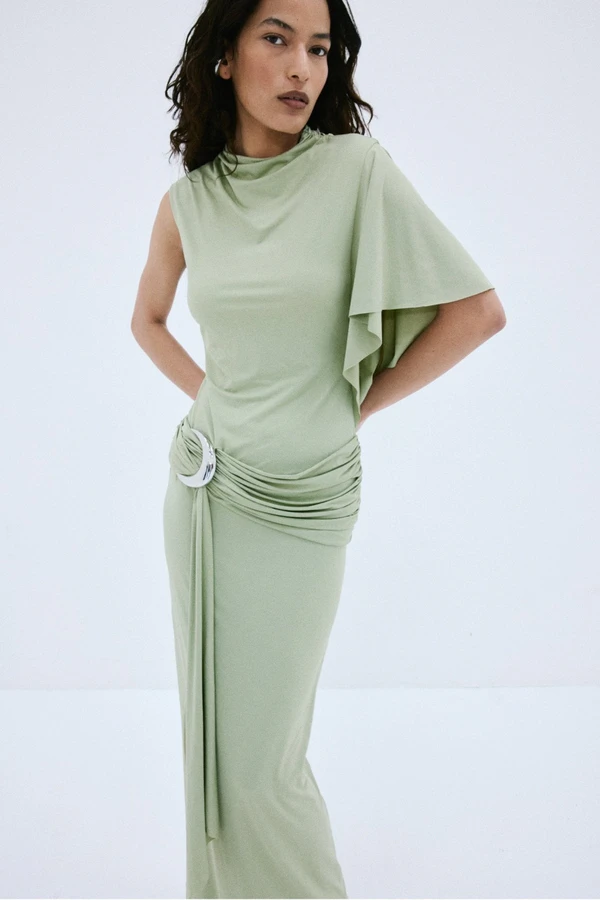 <a href="https://www.delavali.com/products/titan-maxi-dress-in-green-spandex-jersey">DE LA VALI Titan Maxi Dress</a>, $835