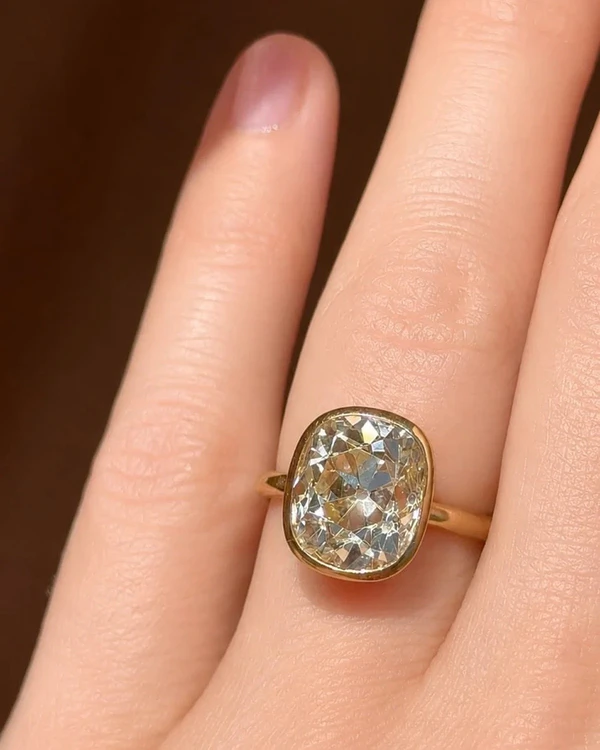 <a href="https://erstwhilejewelry.com/products/old-mine-diamond-bezel-engagement-ring-yellow-gold">Erstwhile Jewelry</a>