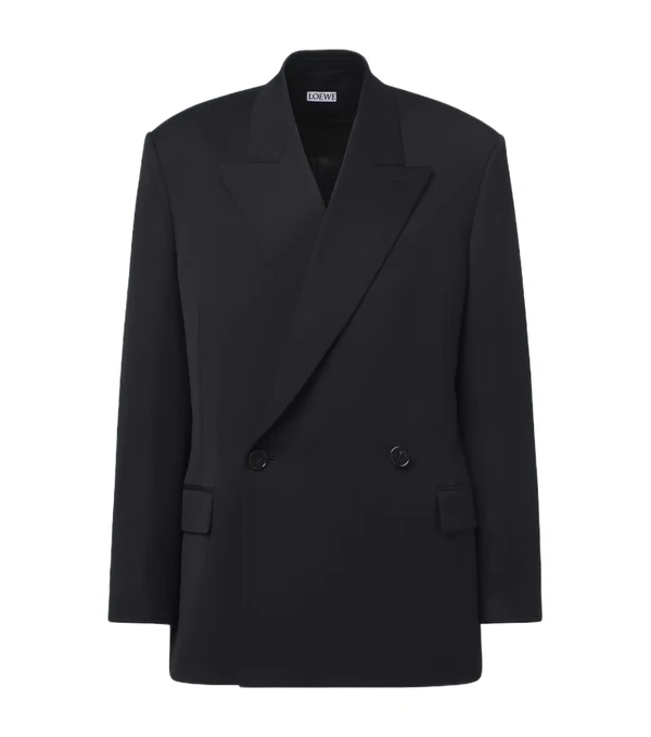 <a href="https://www.mytheresa.com/us/en/men/loewe-double-breasted-wool-blazer-blue-p01207444">LOEWE Blazer</a> from Mytheresa, $3600