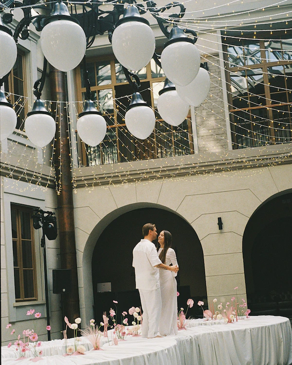 A Whimsical Wedding with a Giant Bow & Curved Tablescape