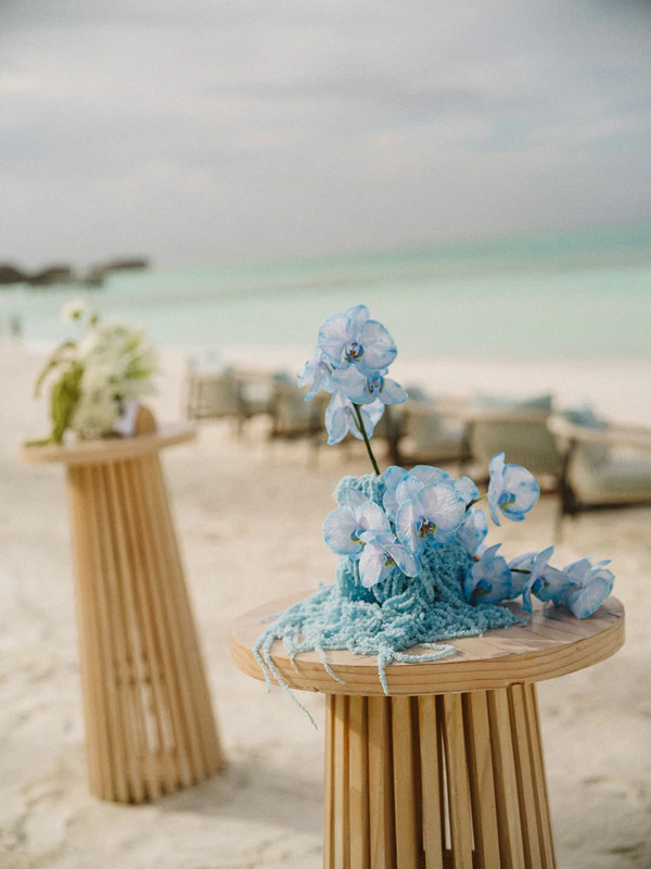 10,000 Lilies & Turquoise Waters Framed This Dreamy Beach Wedding in the Maldives