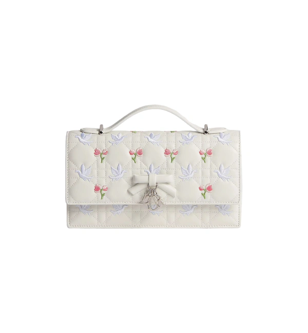 <a href="https://www.dior.com/en_us/fashion/products/S0984PHJJ_M933">DIOR Bag</a>, $4300