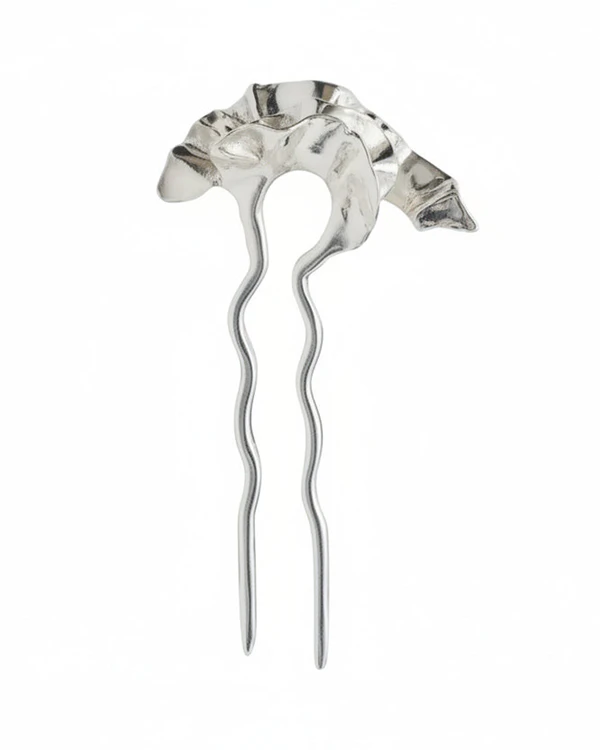 <a href="https://www.arianaboussardreifel.com/collections/hair/products/copy-of-apus-hair-pin">ARIANA BOUSSARD-REIFEL Manus Hair Pin</a>, $295