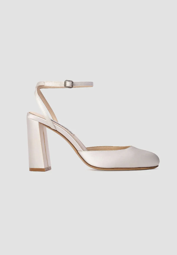 <a href="https://www.saksfifthavenue.com/product/anne-barge-amara-satin-pumps-0400026178575.html?dwvar_0400026178575_size=42+%2812%29&amp;dwvar_0400026178575_color=WHITE+SATIN&amp;site_refer=CSE_GGLPLA%3ALsd+Shoes%3AAnne+Barge&amp;country=US&amp;currency=USD&amp;site_refer=360i+G+CSE&amp;kw_refer=%24SAKS_G_PLA_Women%27s+Shoes_Baseline%24SAKS_G_PLA_Women%27s+Shoes_Baseline_Women%27s+Shoes%24PRODUCT_GROUP&amp;gclsrc=aw.ds&amp;gad_source=1&amp;gad_campaignid=23019487410&amp;gbraid=0AAAAADO6JtTuakB2sNmZYgCkx_f14gUIa&amp;gclid=CjwKCAjw_KjVBhAHEiwAnC0N9LV2DGRxCfnOS4EA3XuduEC_hm0hLsdAVZqcbMntiq2KyFe72JOsnRoCVhwQAvD_BwE">ANNE BARGE Crystal-Embellished Satin Pumps from Saks Fifth Avenue, $450</a>