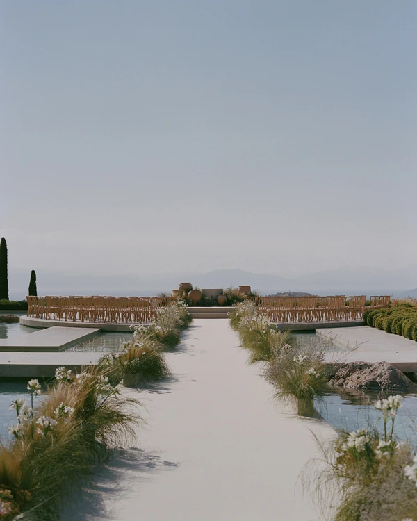 A Cinematic & Artistic Color-Washed Wedding Weekend at Amanzoe in Greece