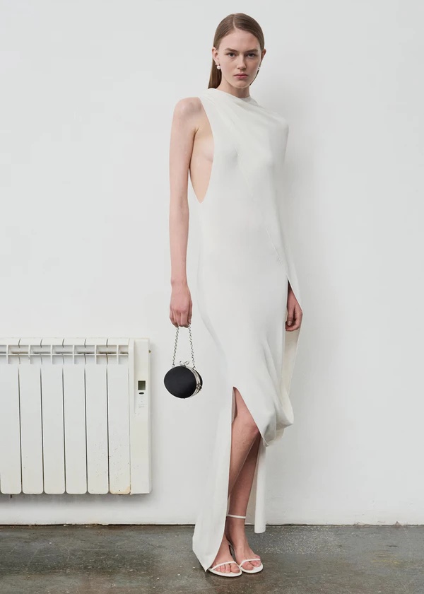 <a href="https://us.self-portrait.com/products/pf26-white-viscose-knit-drape-maxi-dress?_pos=21&amp;_fid=f37461007&amp;_ss=c&amp;_gl=1*8s6vqz*_up*MQ..*_ga*NjkwMDg3NDE1LjE3ODA0ODM2OTQ.*_ga_2EK45EZ9KD*czE3ODA0ODM2OTQkbzEkZzEkdDE3ODA0ODQwMjIkajIkbDEkaDEzMzAxNDE2ODA.">SELF-PORTRAIT Dress</a>, $740