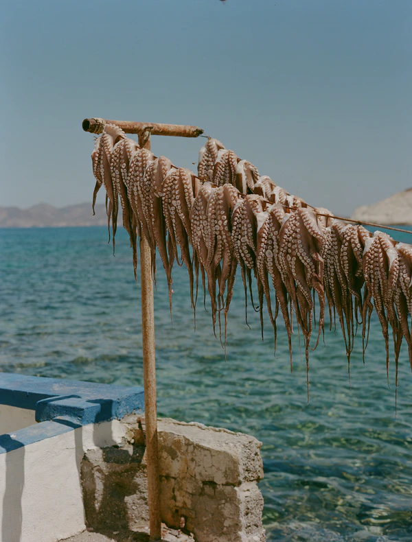 A Cinematic & Artistic Color-Washed Wedding Weekend at Amanzoe in Greece