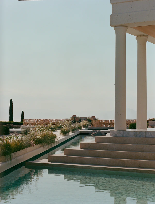 A Cinematic & Artistic Color-Washed Wedding Weekend at Amanzoe in Greece