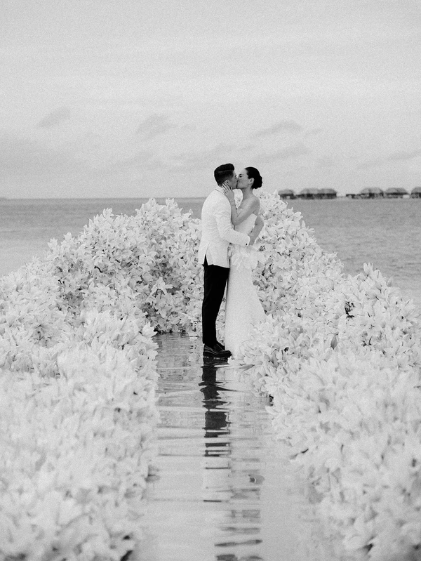 10,000 Lilies & Turquoise Waters Framed This Dreamy Beach Wedding in the Maldives