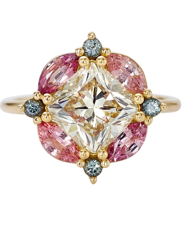 <a href="https://www.artemerstudio.com/products/mosaic-engagement-ring-with-cushion-cut-diamond-and-sapphires">Artemer Studio</a>