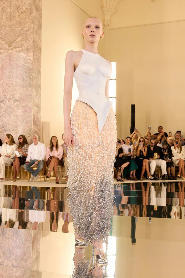 <a href="https://schiaparelli.com/en/pages/haute-couture-automne-hiver-2026-27">Schiaparelli</a>