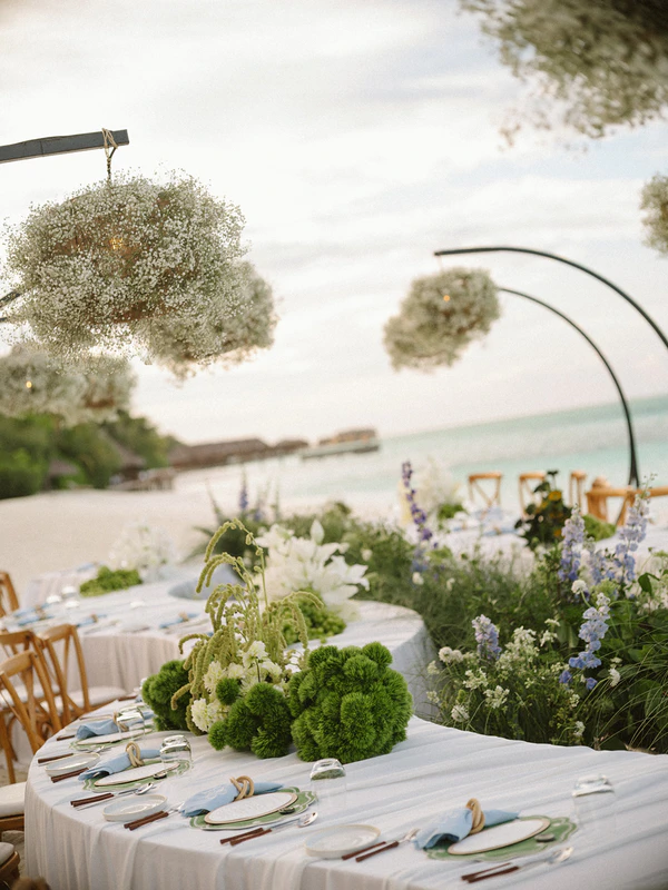 10,000 Lilies & Turquoise Waters Framed This Dreamy Beach Wedding in the Maldives