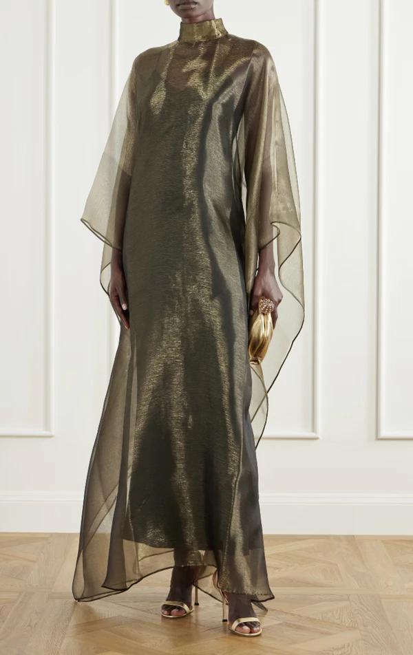 <a href="https://www.net-a-porter.com/en-us/shop/product/taller-marmo/clothing/gowns/sphinx-lurex-fil-coupe-gown/46376663163138055">TALLER MARMO Kaftan Gown from Net-a-Porter, $2,140</a>