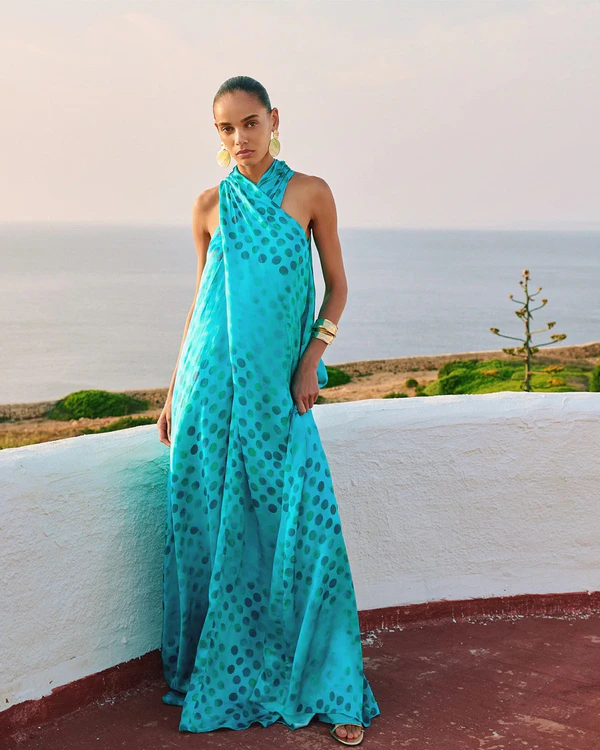 <a href="https://dimaayad.com/collections/dresses/products/polka-dot-gathered-halter-neck-dress-copy?variant=47611407433891">DIMA AYAD Polka Dot Halter Dress</a>, $1,420