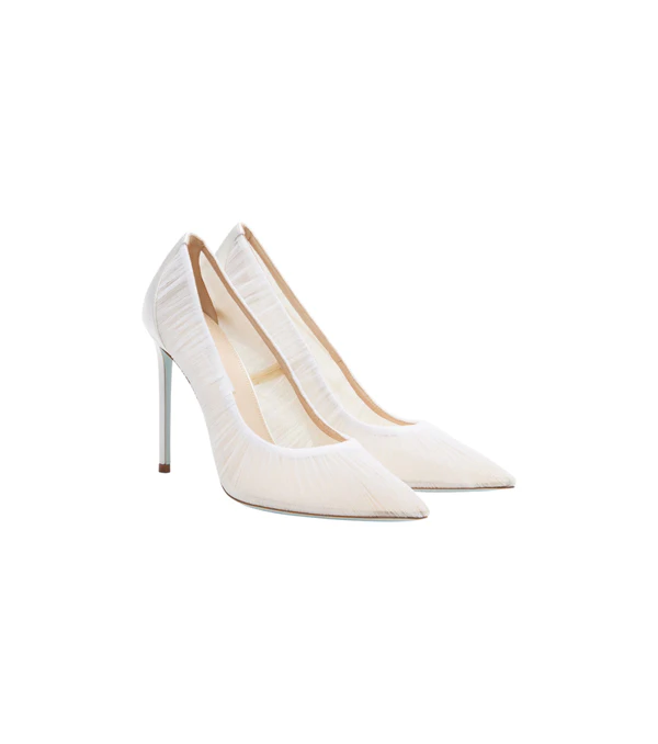 <a href="https://www.mytheresa.com/us/en/women/aquazzura-voile-105-satin-trimmed-tulle-pumps-white-p01138047">AQUAZZURA Pumps</a> from Mytheresa, $928
