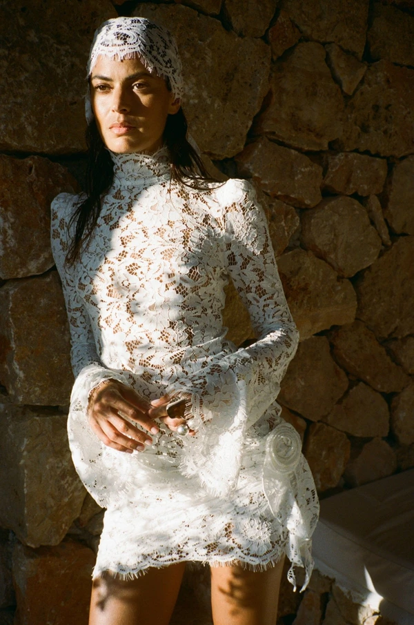 <a href="https://www.delavali.com/products/bodita-mini-dress-cotton-lace-white">DE LA VALI Dress</a>, $695