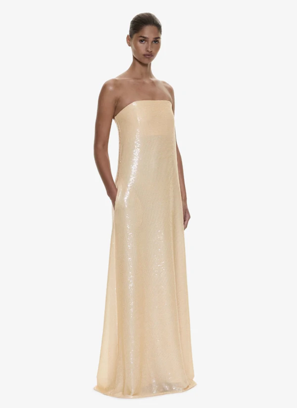 <a href="https://christopheresber.com/products/opaline-sequin-strapless-gown-butter">CHRISTOPHER ESBER Opaline Sequin Strapless Gown in Butter, $995</a>