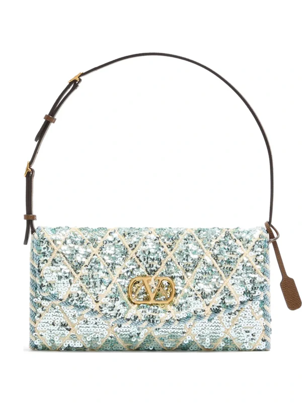 <a href="https://www.farfetch.com/shopping/women/valentino-garavani-devain-rhombelle-sequin-embroidery-shoulder-bag-item-35664065.aspx">VALENTINO Bag</a> from Farfetch, $3200