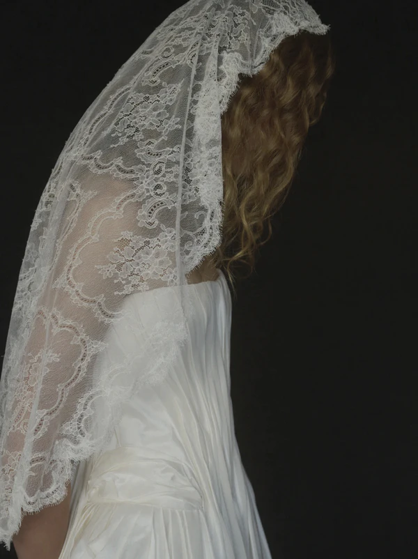 <a href="https://alexandragrecco.com/products/lace-mantilla-veil?Title=Default+Title">Alexandra Grecco</a>