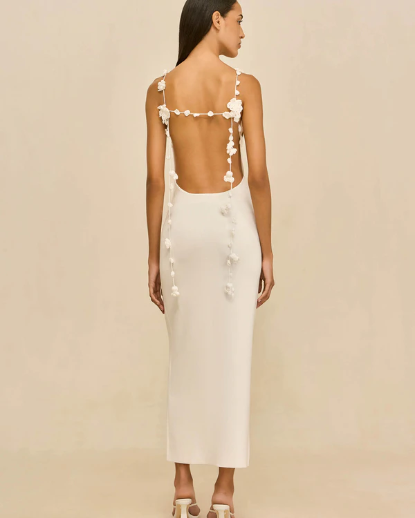 <a href="https://cultgaia.com/products/giuliana-dress-off-white?variant=43170850504778" target="_blank">CULT GAIA Giuliana Knit Dress, $898</a>