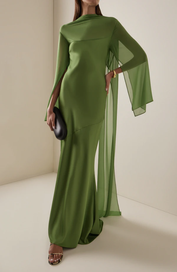 <a href="https://www.modaoperandi.com/women/p/significant-other/devlyn-long-sleeve-gown-exclusive/718550">SIGNIFICANT OTHER Devlyn Sheer-Overlay Gown from Moda Operandi, $495</a>