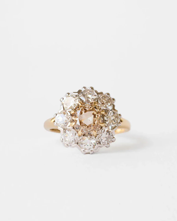 <a href="https://junerings.com/products/double-cut-champagne-cushion-solitaire-oak">June Rings</a>