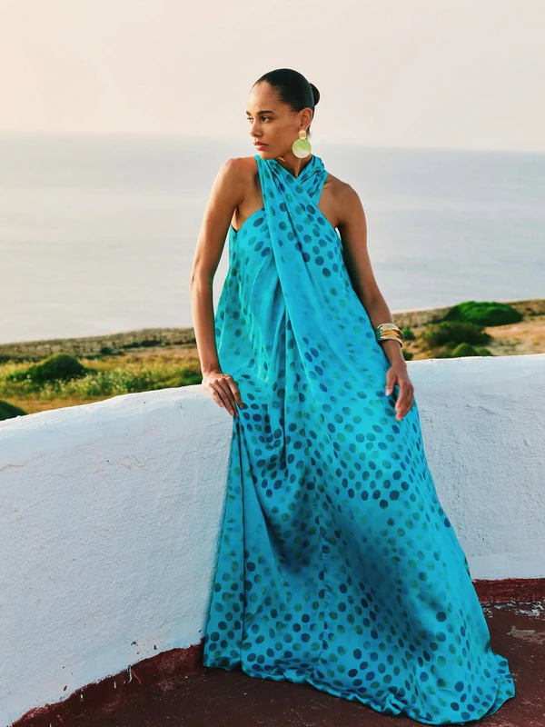 <a href="https://dimaayad.com/collections/dresses/products/polka-dot-gathered-halter-neck-dress-copy?_pos=17&amp;amp;_fid=5fde2a32d&amp;amp;_ss=c&amp;amp;variant=47611407433891">DIMA AYAD Polka-Dot Halter Dress</a>, $1,420