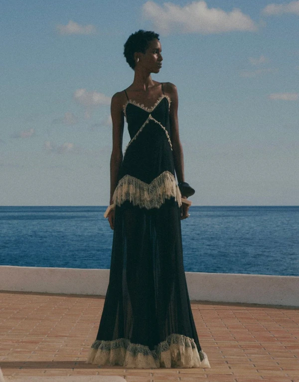 <a href="https://www.delavali.com/products/estela-maxi-dress-in-black-viscose-georgette">DE LA VALI Estela Maxi Dress in Black Viscose Georgette, $1,150</a>