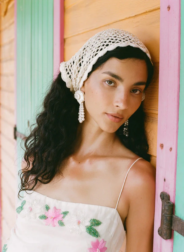 <a href="https://forloveandlemons.com/products/tidal-treasure-earrings-white">FOR LOVE &amp; LEMONS Tidal Treasure Earrings</a>, $150
