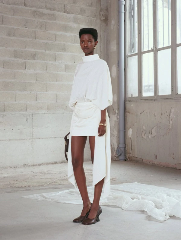 <a href="https://arakii.com/p/open-side-mini-dress-off-white">ARAKII Dress</a>, $460