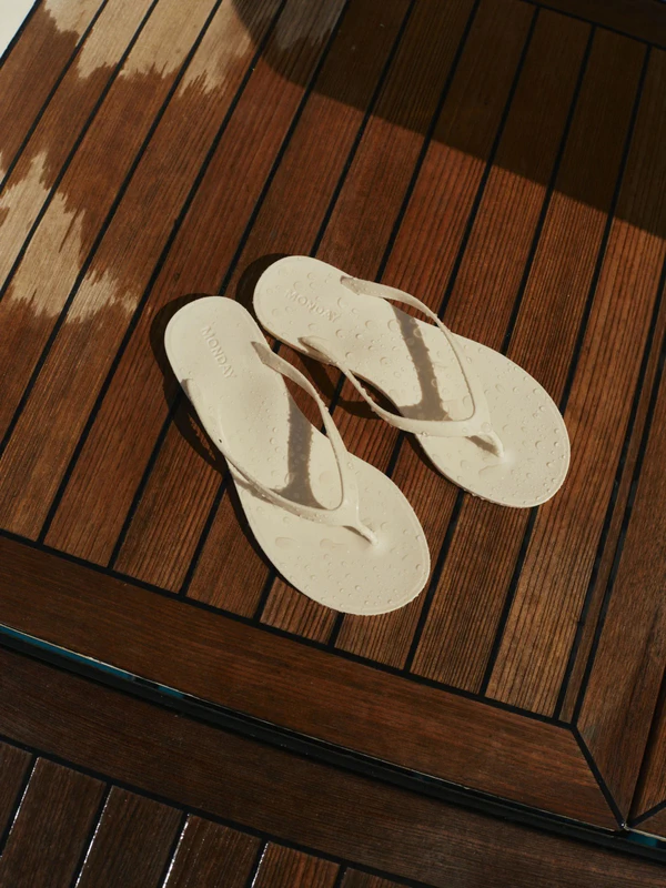 <a href="https://mondayswimwear.com/collections/beachwear-accessories/products/sardinia-sandal-ivory">MONDAY SWIMWEAR Sardinia Sandal</a>, $113