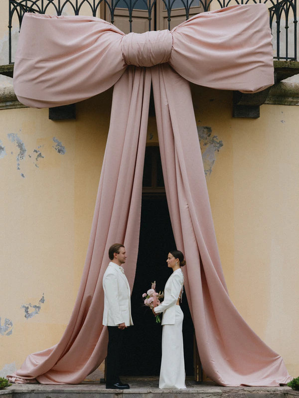 A Whimsical Wedding with a Giant Bow & Curved Tablescape