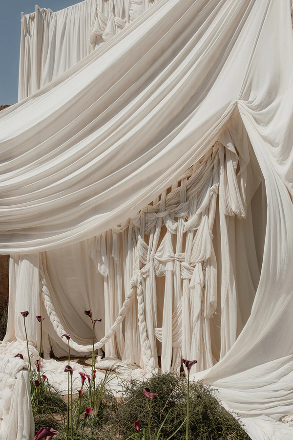 Giant Sculptural Florals & Dreamy Drapery by Mia Sylvia at This Stone Quarry Wedding in Menorca
