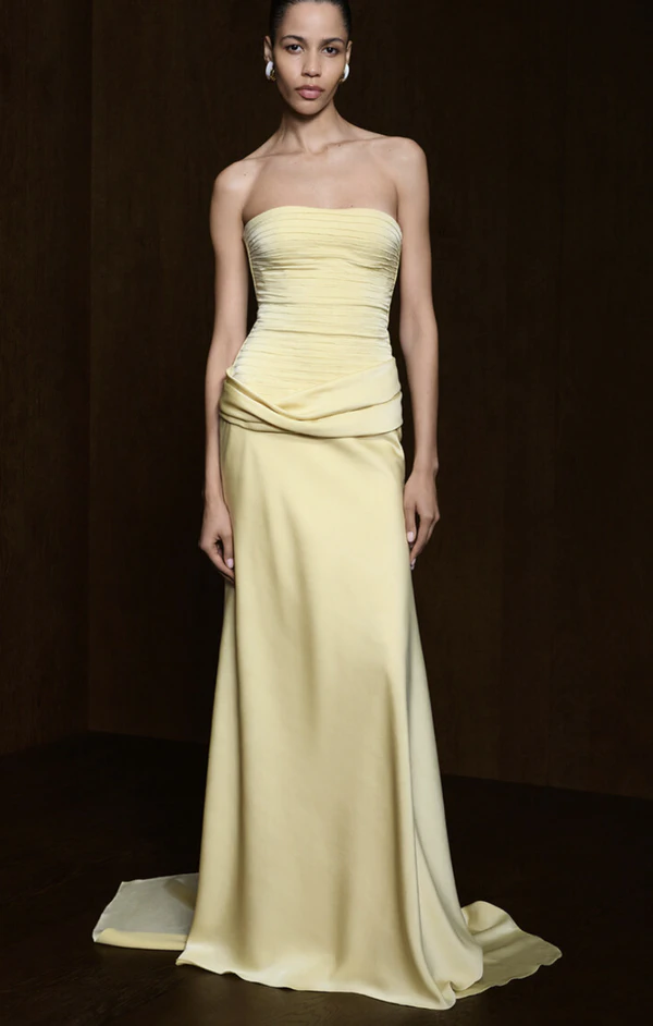 <a href="https://www.modaoperandi.com/women/p/marmar-halim/strapless-draped-silk-satin-gown/735430">MARMAR HALIM Draped Silk Satin Gown from Moda Operandi, $2,940</a>