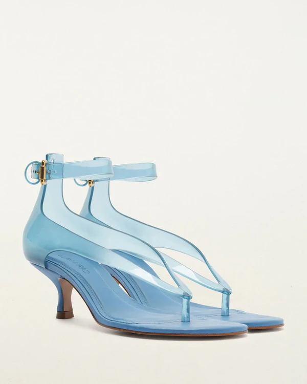 <a href="https://farmrio.com/products/jelly-heel-sandal">FARM RIO Blue Jelly Heel Sandal</a>, $188