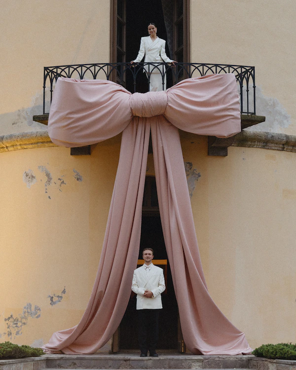 A Whimsical Wedding with a Giant Bow & Curved Tablescape