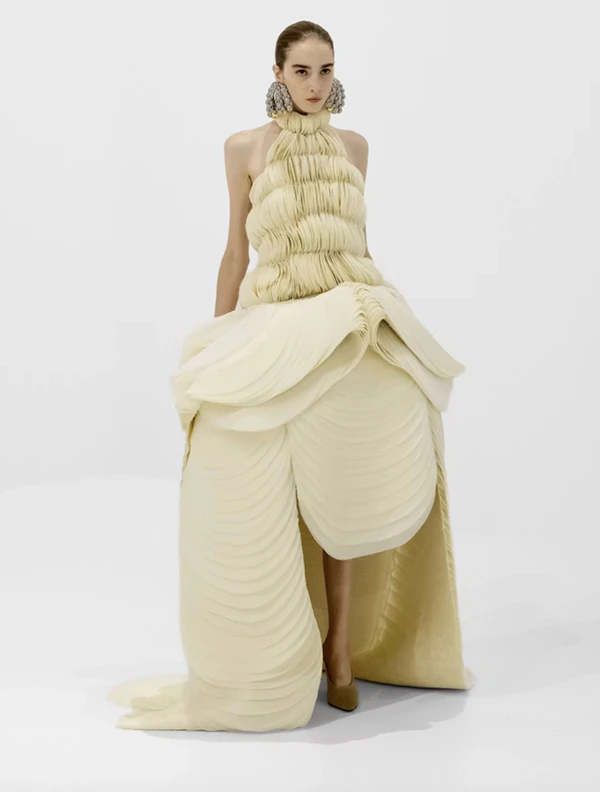 <a href="https://fashion.jeanpaulgaultier.com/en-ae/lookbooks/haute-couture-autumn-winter-2026?lookbookId=haute-couture-aw26-look-22" target="_blank" rel="noopener noreferrer">Jean Paul Gaultier</a>