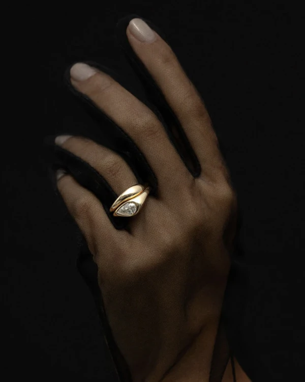 <a href="https://junerings.com/products/marlow-east-west-pear">JUNE Ring</a>, $3,500