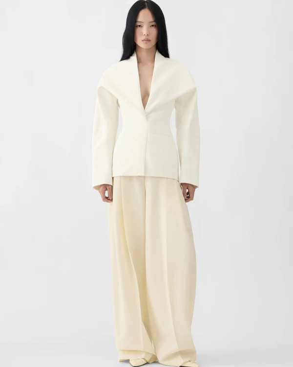 <a href="https://www.jacquemus.com/en_us/the-ch%C3%A2le-jacket/JAW00133AW00733110.html">JACQUEMUS Jacket</a>, $1690, <a href="https://www.jacquemus.com/en_us/the-man-s-pants/PAW00615AW00637110.html">JACQUEMUS Pants</a>, $850